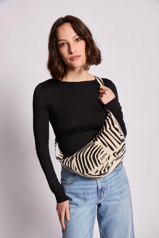 Andrea Zebra in Cream Half-Moon Bag