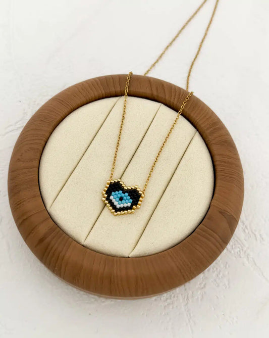 Gold Curvy Heart Eye Necklace